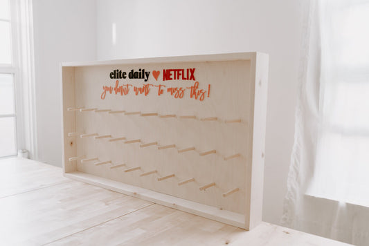 Donut Wall - Framed and Fully Customizable. Perfect for weddings, special events, and branding. 44" x 24" up to 80 donuts.