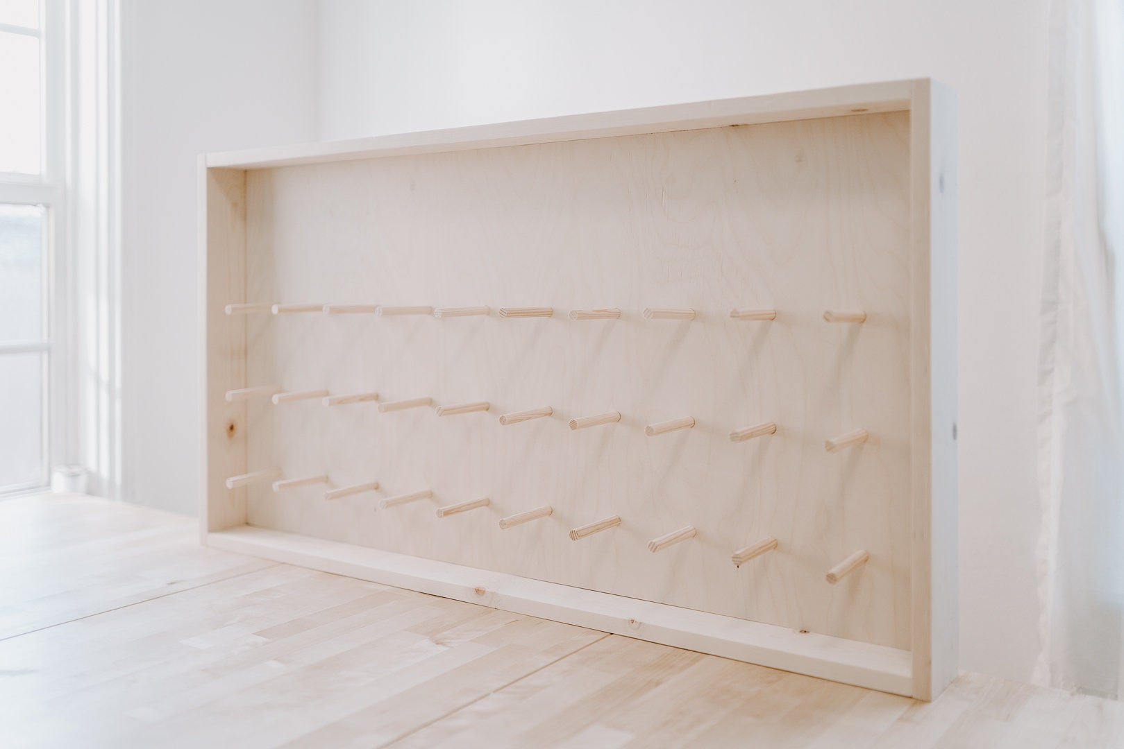 Donut Wall - Framed and Fully Customizable. Perfect for weddings, special events, and branding. 44" x 24" up to 80 donuts.