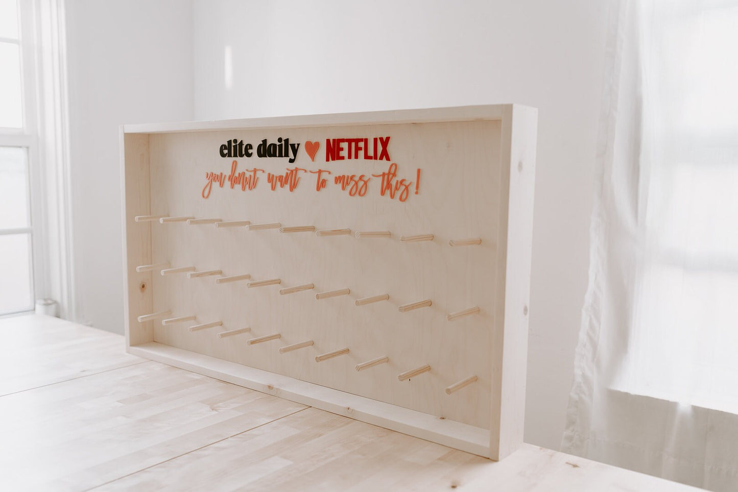 Donut Wall - Framed and Fully Customizable. Perfect for weddings, special events, and branding. 44" x 24" up to 80 donuts.