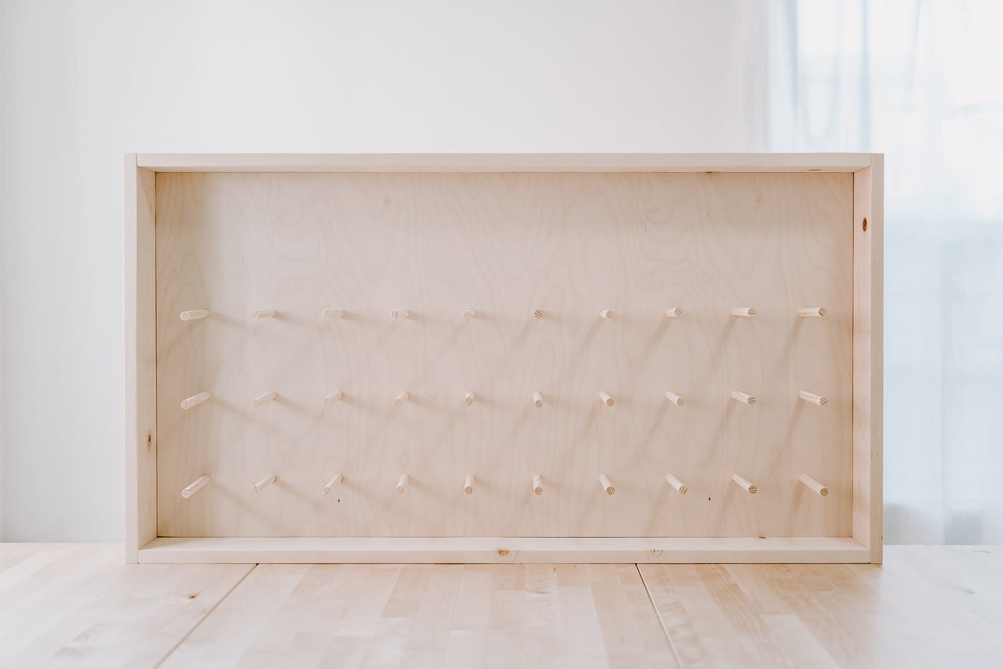 Donut Wall - Framed and Fully Customizable. Perfect for weddings, special events, and branding. 44" x 24" up to 80 donuts.