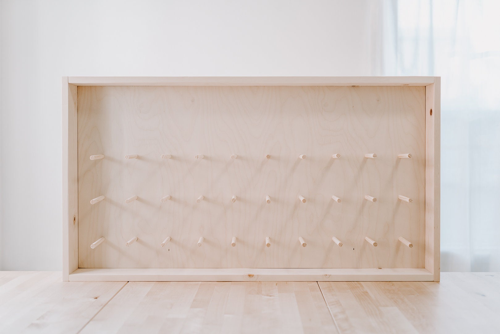 Donut Wall - Framed and Fully Customizable. Perfect for weddings, special events, and branding. 44" x 24" up to 80 donuts.